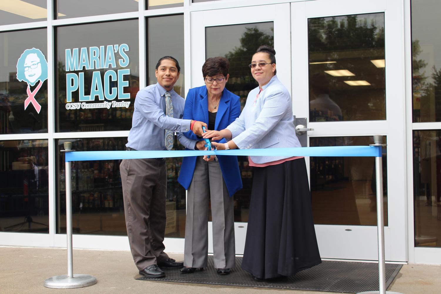 From left to right: Maria's Place Coordinator Freddy Rios, CCSU President Dr. Zulma Toro and Maria A. Alvarez's daughter Melina Lopez cut the ribbon for Maria's Place Friday.