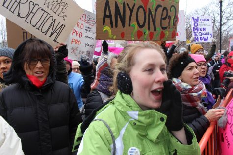 Danielle Brochu of East Hartford chants along at the Womens March in Hartford last Saturday. 