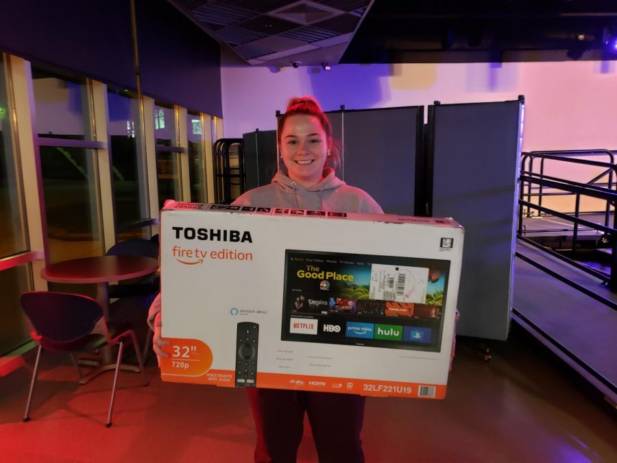 Grand prize winner Julia Annese pictured with Toshiba Fire T.V