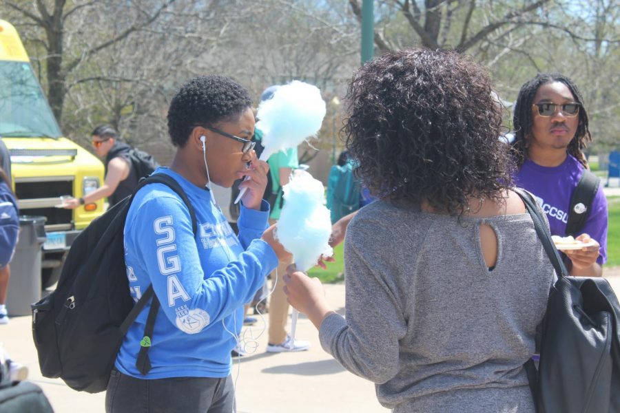 With friends, students stood inside the Student Center Circle enjoying blue cotton candy. 