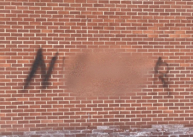 One racial slur was spray painted outside the Student Center facing Welte Garage.