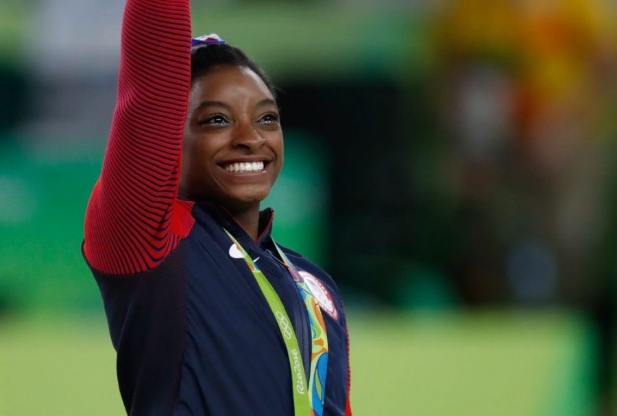 Simone Biles is one of many elite athletes debating if they should compete in the 2021 Olympic Games.