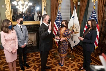 Miguel Cardona is sworn in by Vice President Kamala Harris (Photo via @SecEducation on Twitter)  