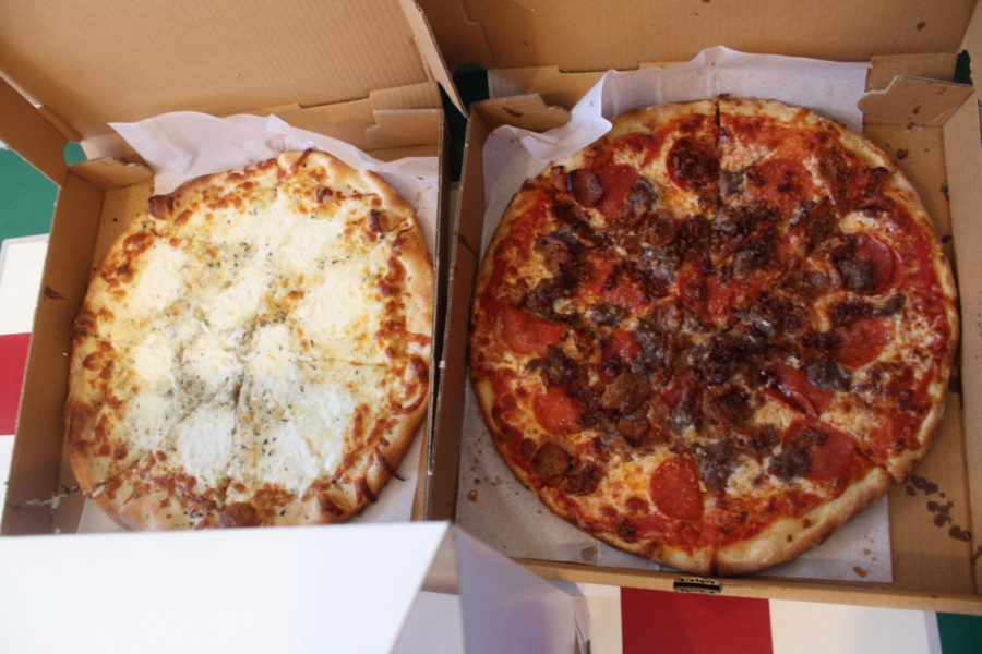 Bros Dough gives customers different types of red and white pizza. Photo by: Melody Rivera