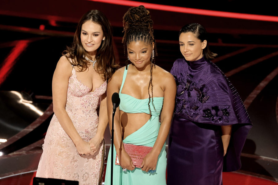 Lily James (Left), Halle Bailey (Center), and Naomi Scott (Right), presented The Academy Award for Best Animated Feature for the 2022 Oscars.