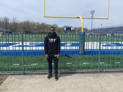 CCSU football player Dexter Lawson Jr. stands near the endzone at Arute Field.