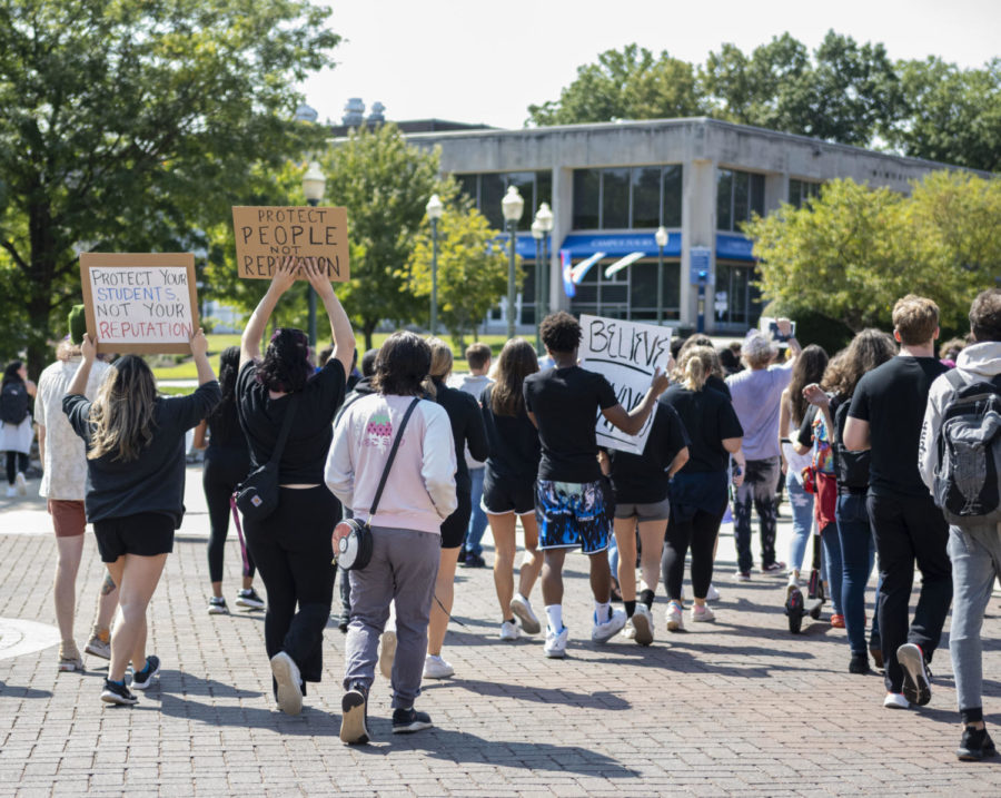 Students return to the center of campus after marching.