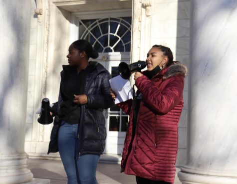 Leaders of the rally speak into a megaphone.