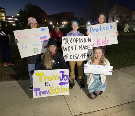 Photo features the posters seen at the protest.