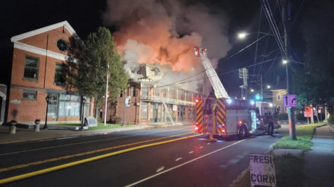 The burning New Hartford House in its final hours as it burned to the ground in August last year. (John Barbagallo, Norfolk Fire Department)