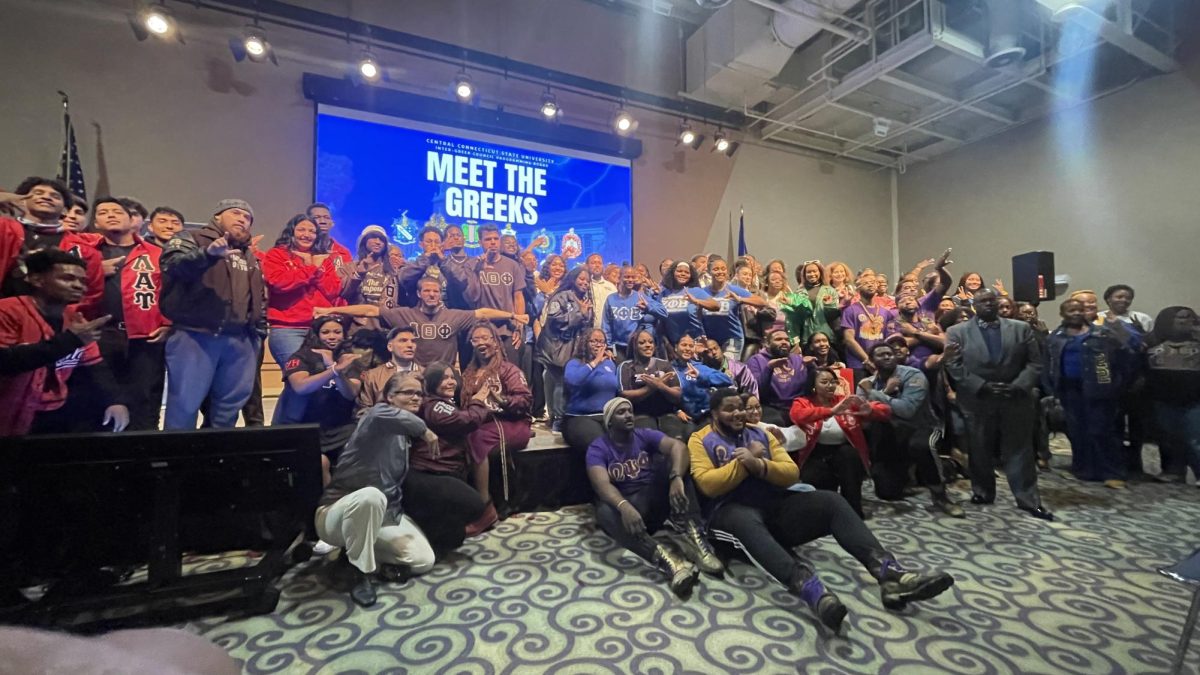 Greek organizations gather to take a group photo at "Meet the Greeks" event.