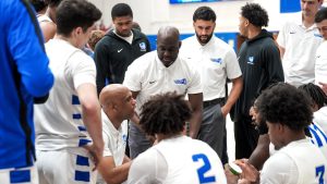 Head Coach Patrick Sellers speaks to his players during a timeout in Sunday's 54-52 loss to LIU.