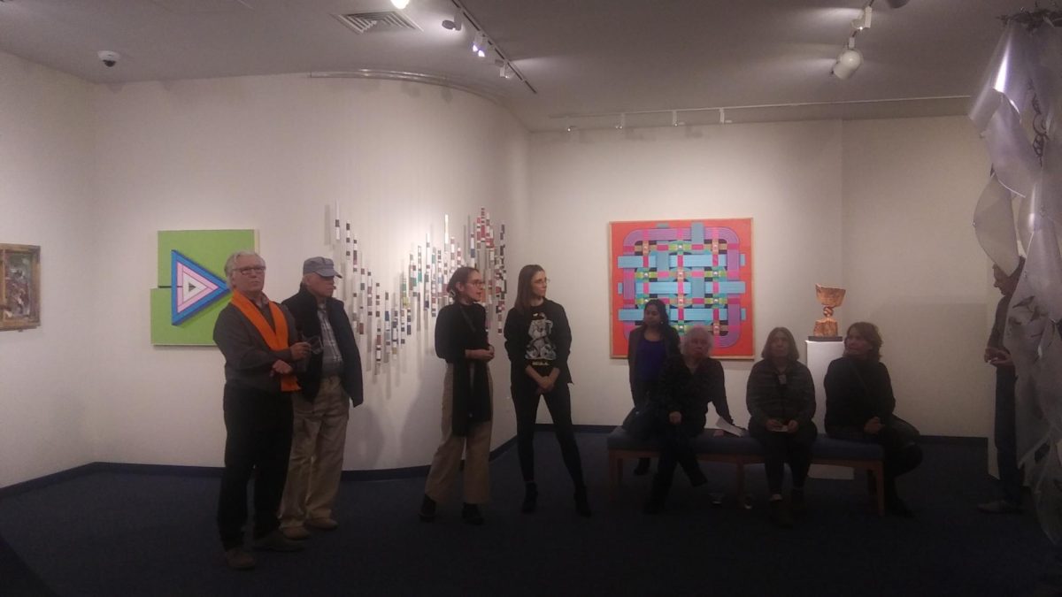 Featured artists at an opening reception for the exhibition.