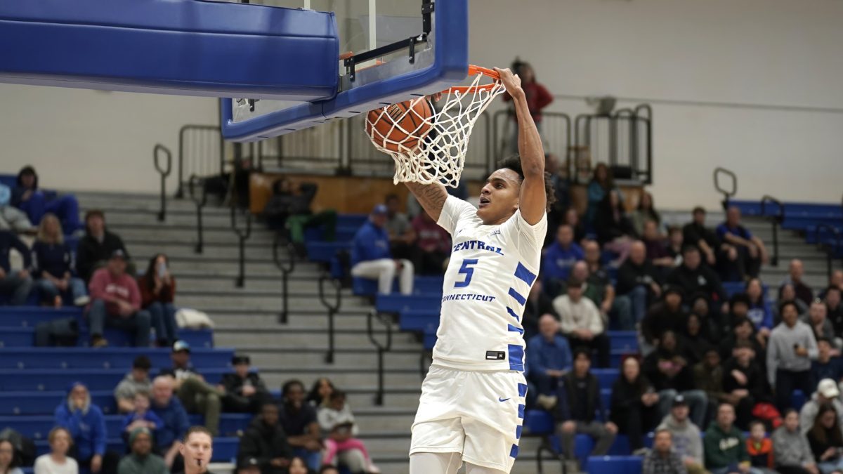 Darin Smith Jr. dunking against Stonehill on Saturday, Feb. 22. 