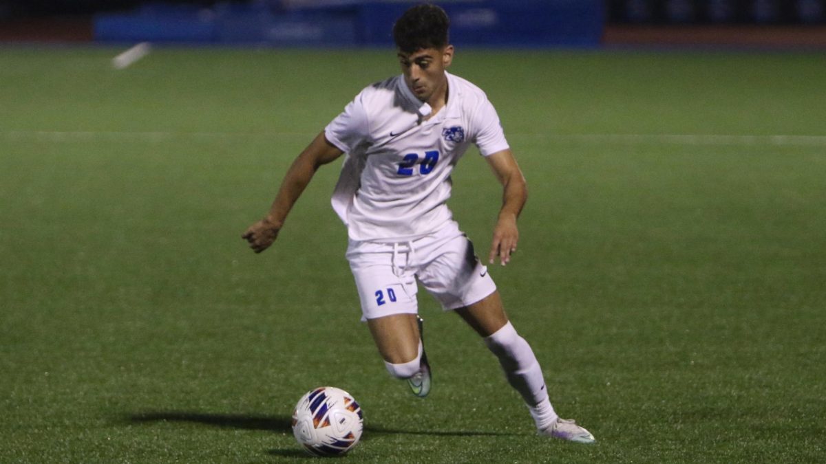 Joey Tata advancing the ball