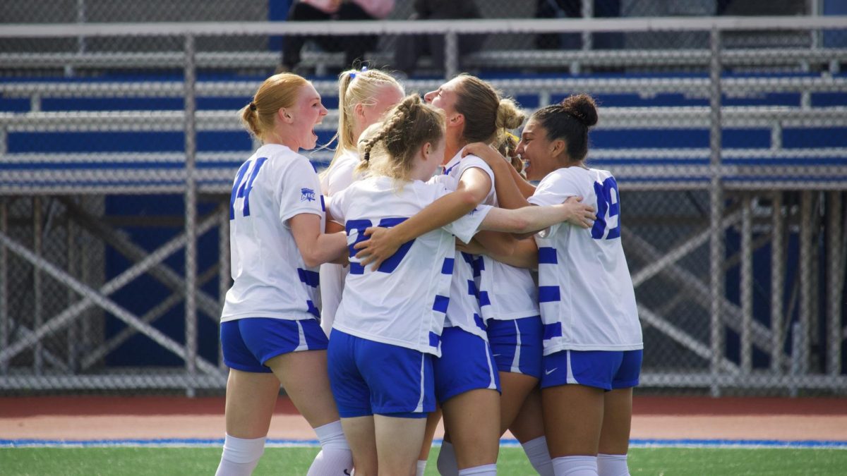 Blue Devils celebrate after Kayla Ward's (29) goal