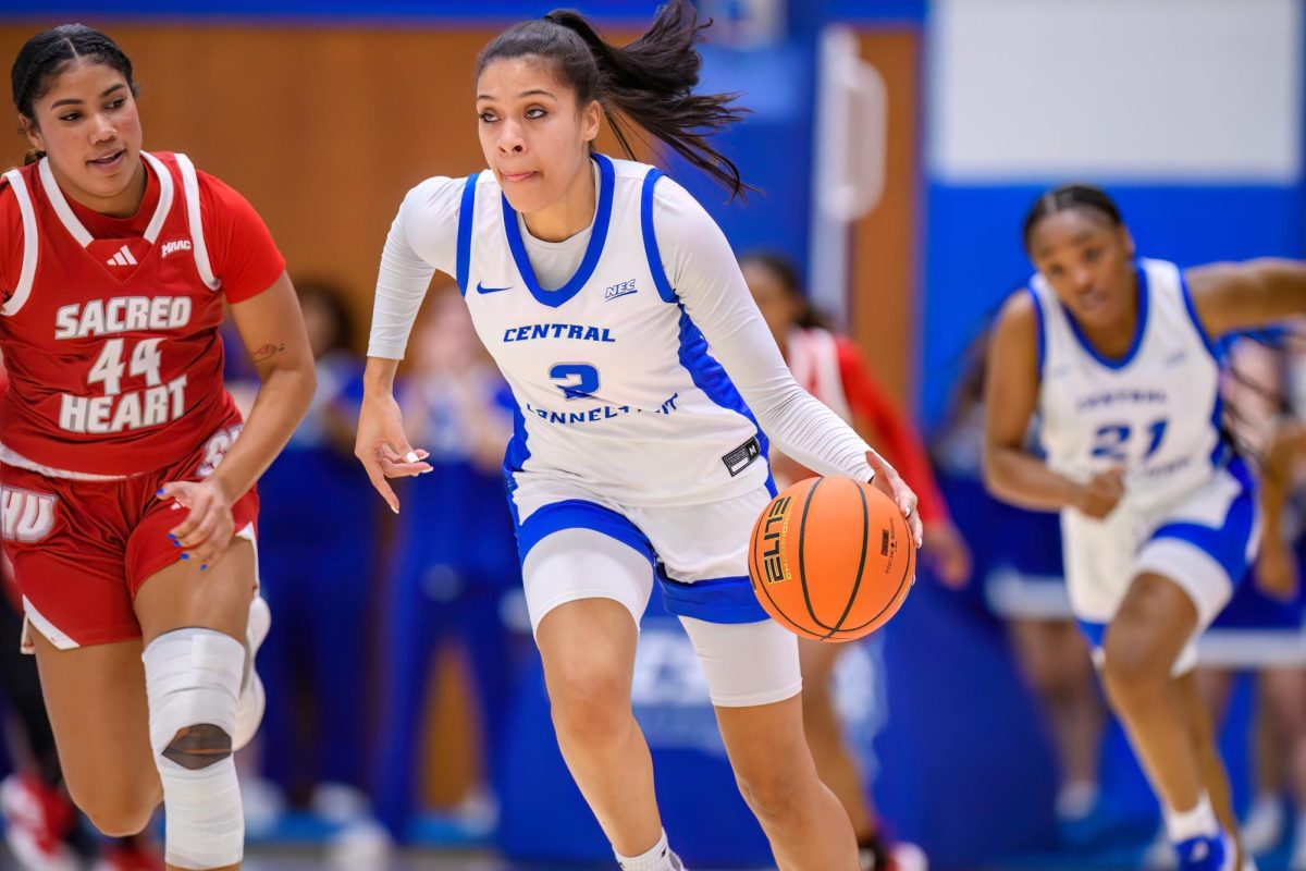 Kiyah Lewis bringing the ball up the court
