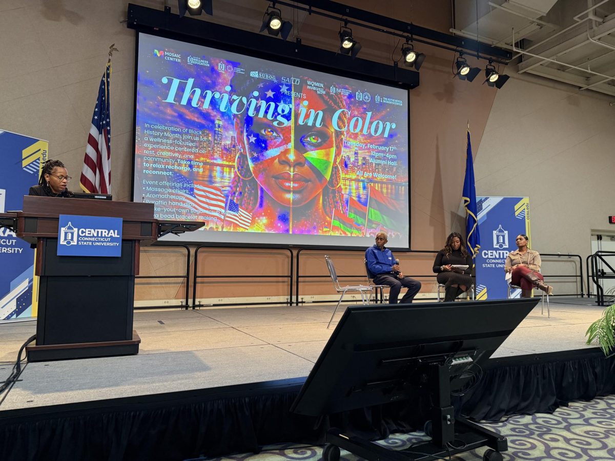 Panelists for the Thriving in Color event speaking in Alumni Hall