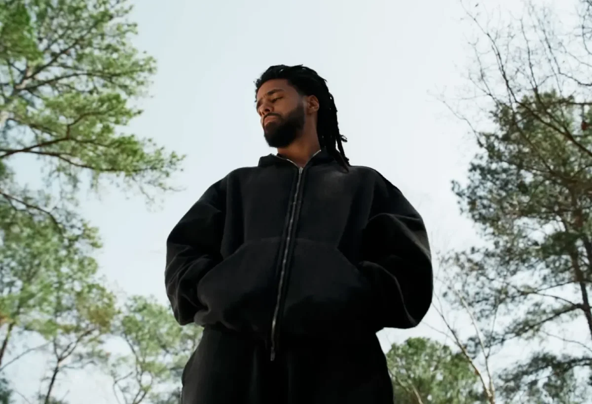 J. Cole posing in his announcement video of The Fall-Off