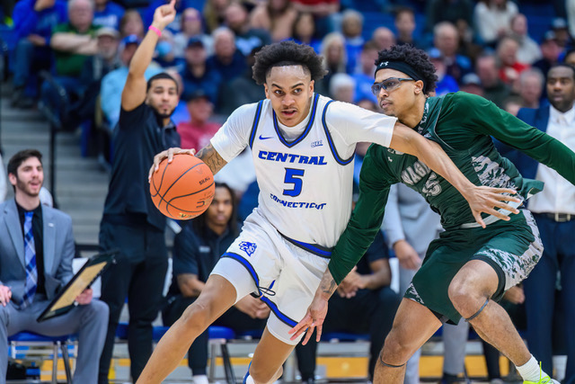 NEC Player of the Year Darin Smith Jr. (5) driving to the basket