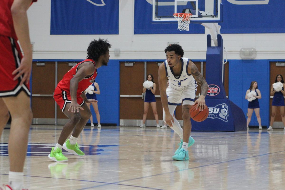 Senior guard Jay Rodgers analyses the Saint Francis defense in an eight-assist performance