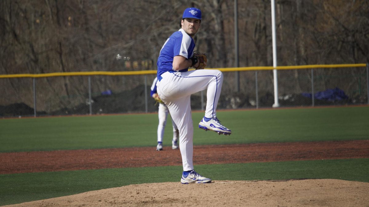 Zach Worzel loading up a pitch against Sacred Heart on March 31