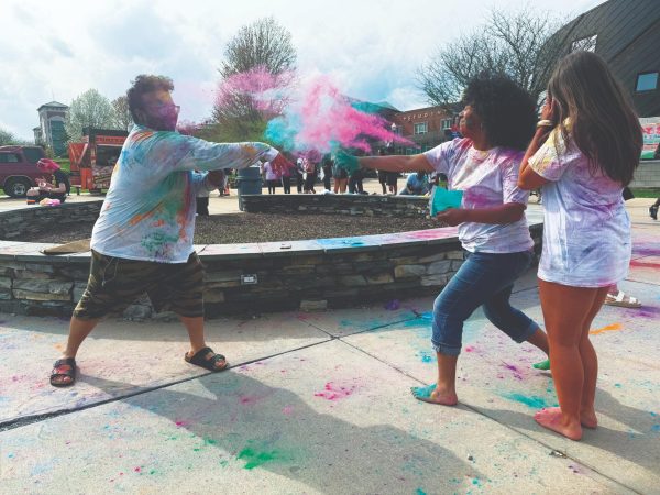 Celebrating the start of warm weather, throwing colors is a part of the 
long tradition of Holi